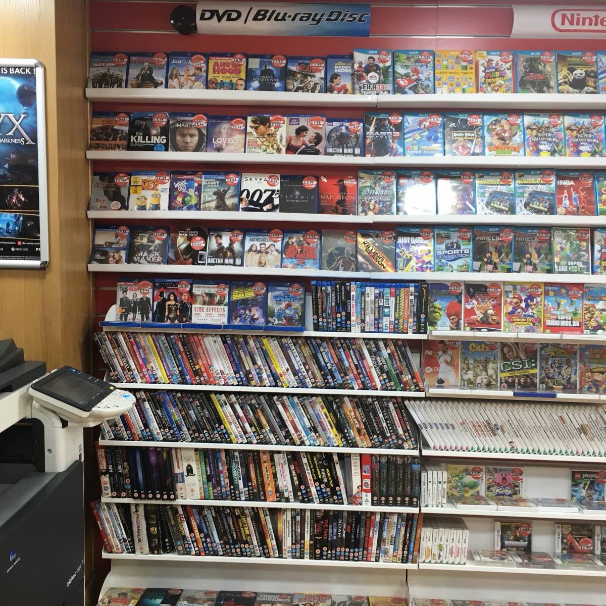 Shelves of pre-owned DVDs, Blu-ray discs and console games at DIGICOM, Whitechapel